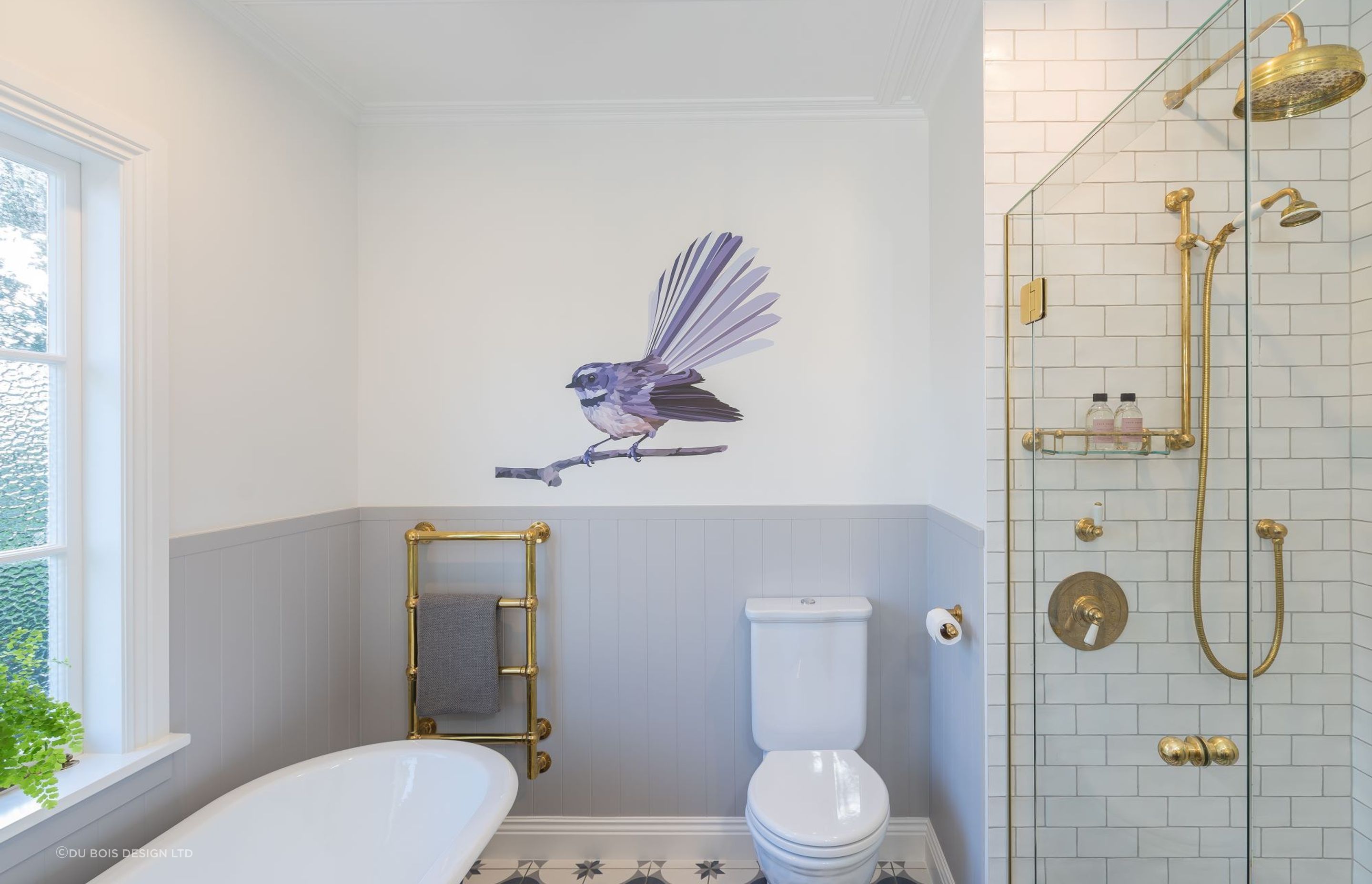 A pleasant wall decal, like the Piwakawaka in this bathroom renovation in Epsom, can make the space more comfortable for kids — Photography: Kallan Mac Leod