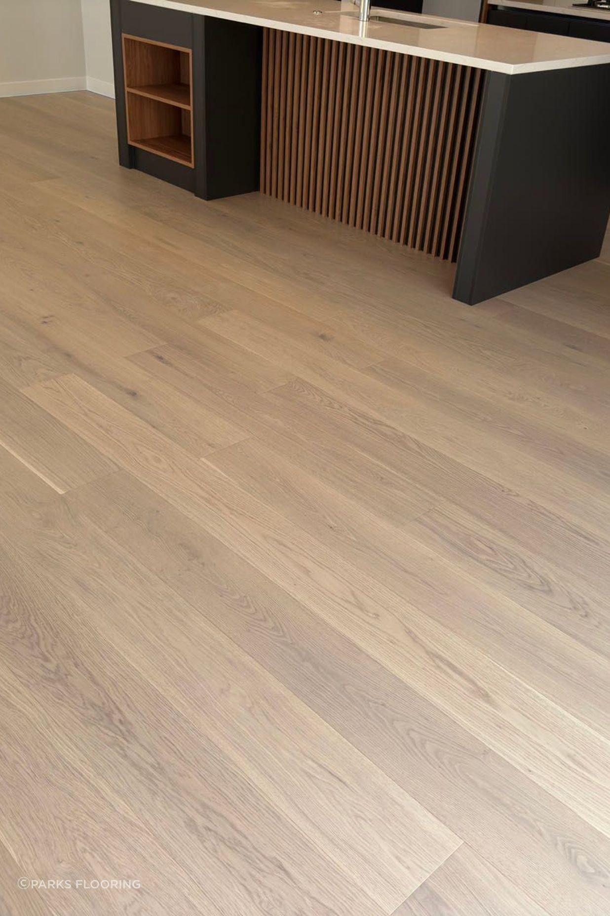 “Flooring can lose its shine or develop stains and scratches if not cared for correctly. Following care instructions ensures the floor will continue to look its best,” David says. Image: Engineered Hardwood in European Oak.