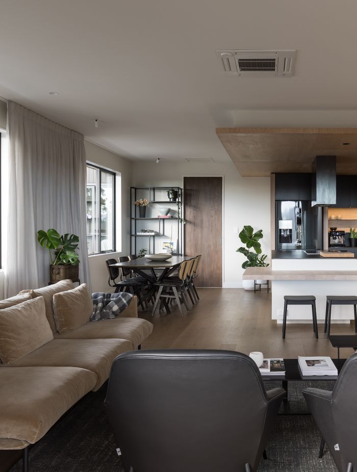 Recessed curtain tracks mean your eye is drawn upward, making the ceiling feel higher and increasing the sense of space.