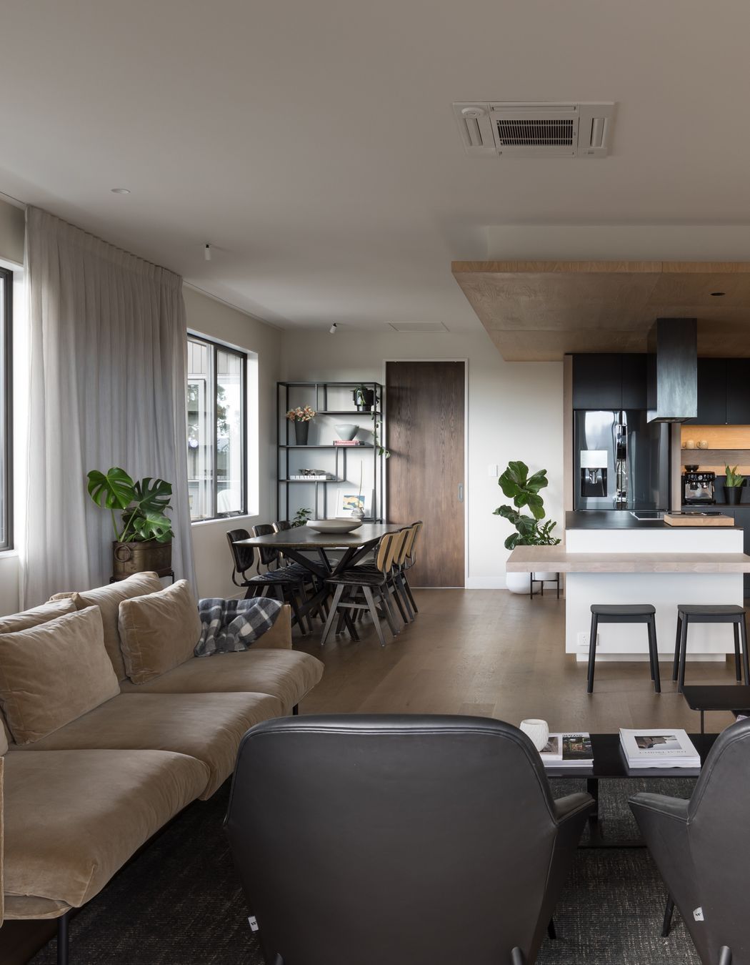 Recessed curtain tracks mean your eye is drawn upward, making the ceiling feel higher and increasing the sense of space.