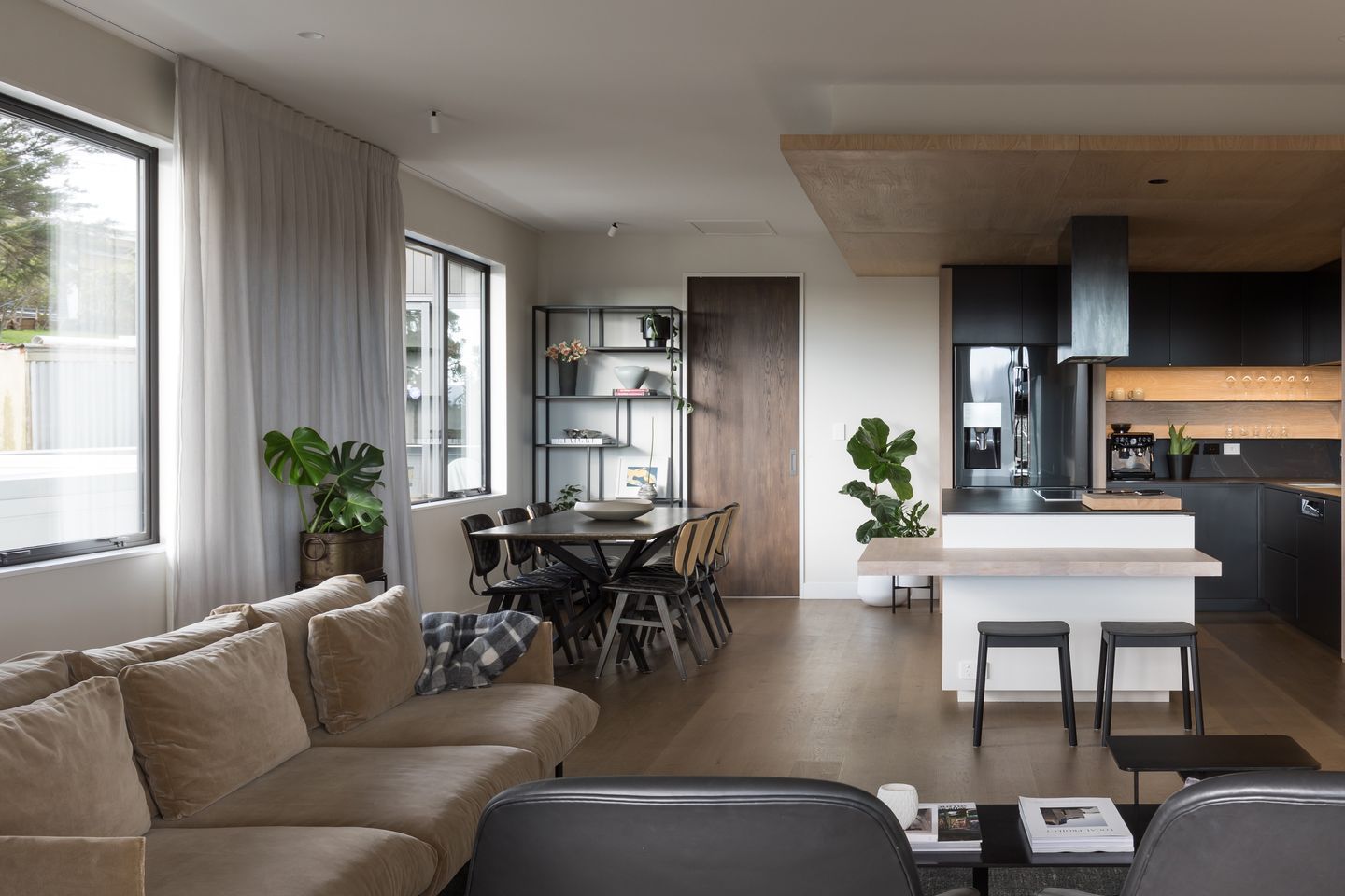 Recessed curtain tracks mean your eye is drawn upward, making the ceiling feel higher and increasing the sense of space.