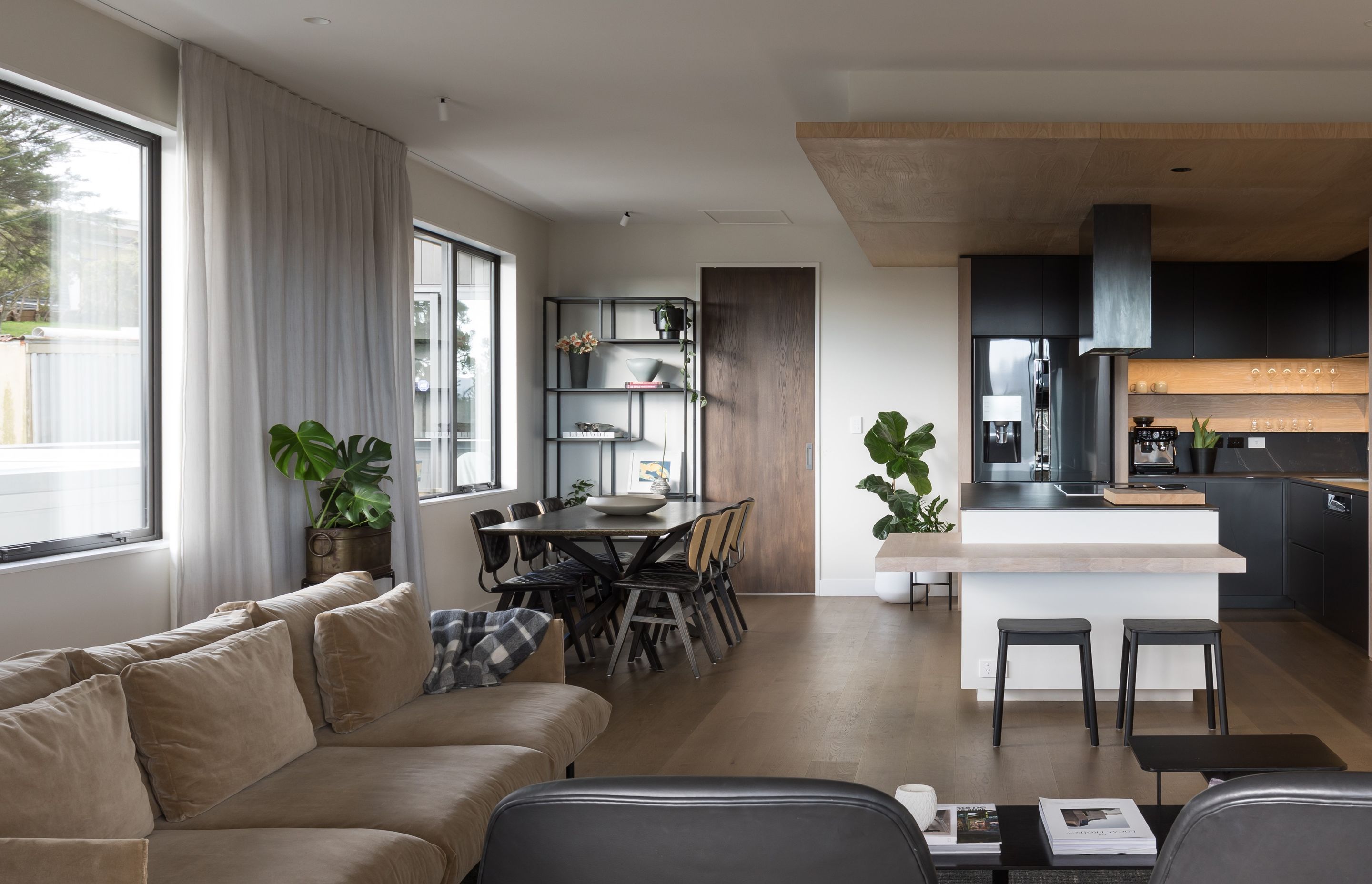 Recessed curtain tracks mean your eye is drawn upward, making the ceiling feel higher and increasing the sense of space.