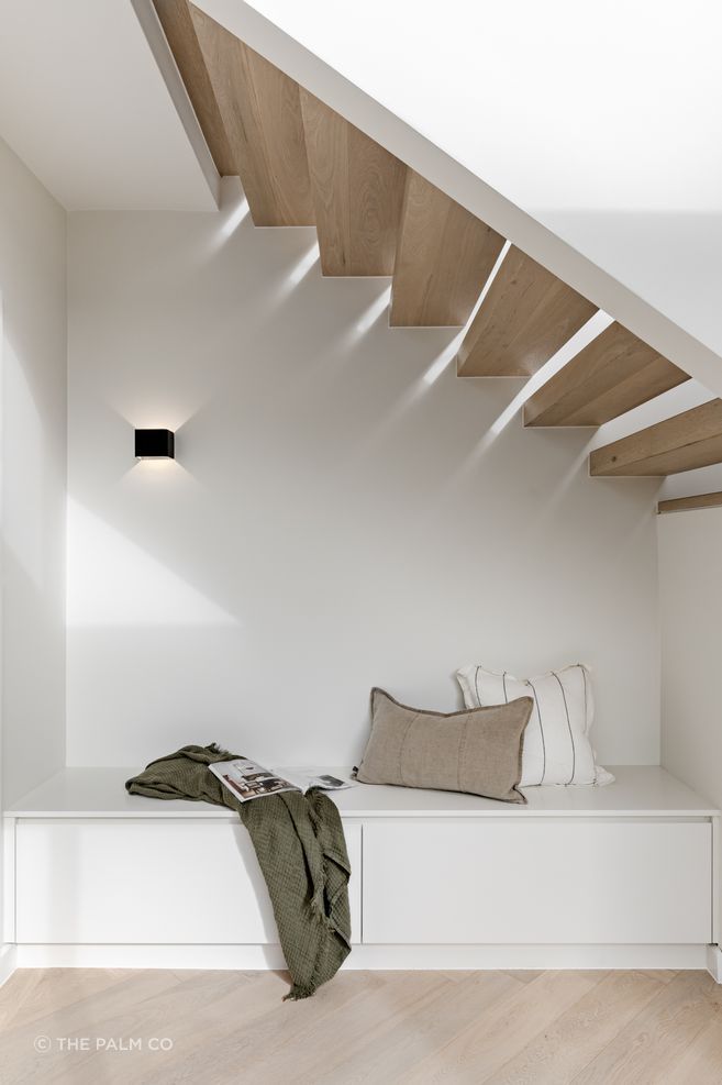 Spaces of relaxation have been elegantly included in the design. An example is this 
reading nook under the stairs.