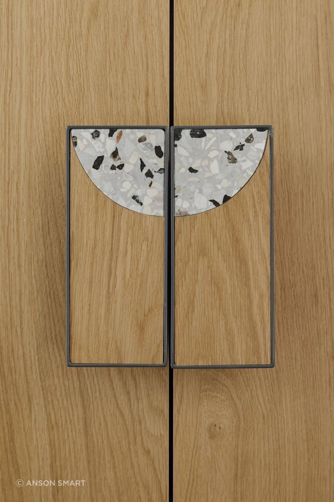 The details count. Here, Fibonacci's terazzo is perfectly inlaid into a timber handle with metal border.