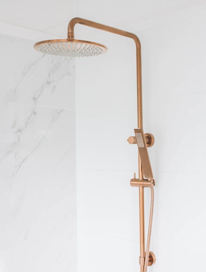 A rail shower head or set can typically be adjusted along a vertical bar. Featured product: ABI Finley Shower Rail Set.