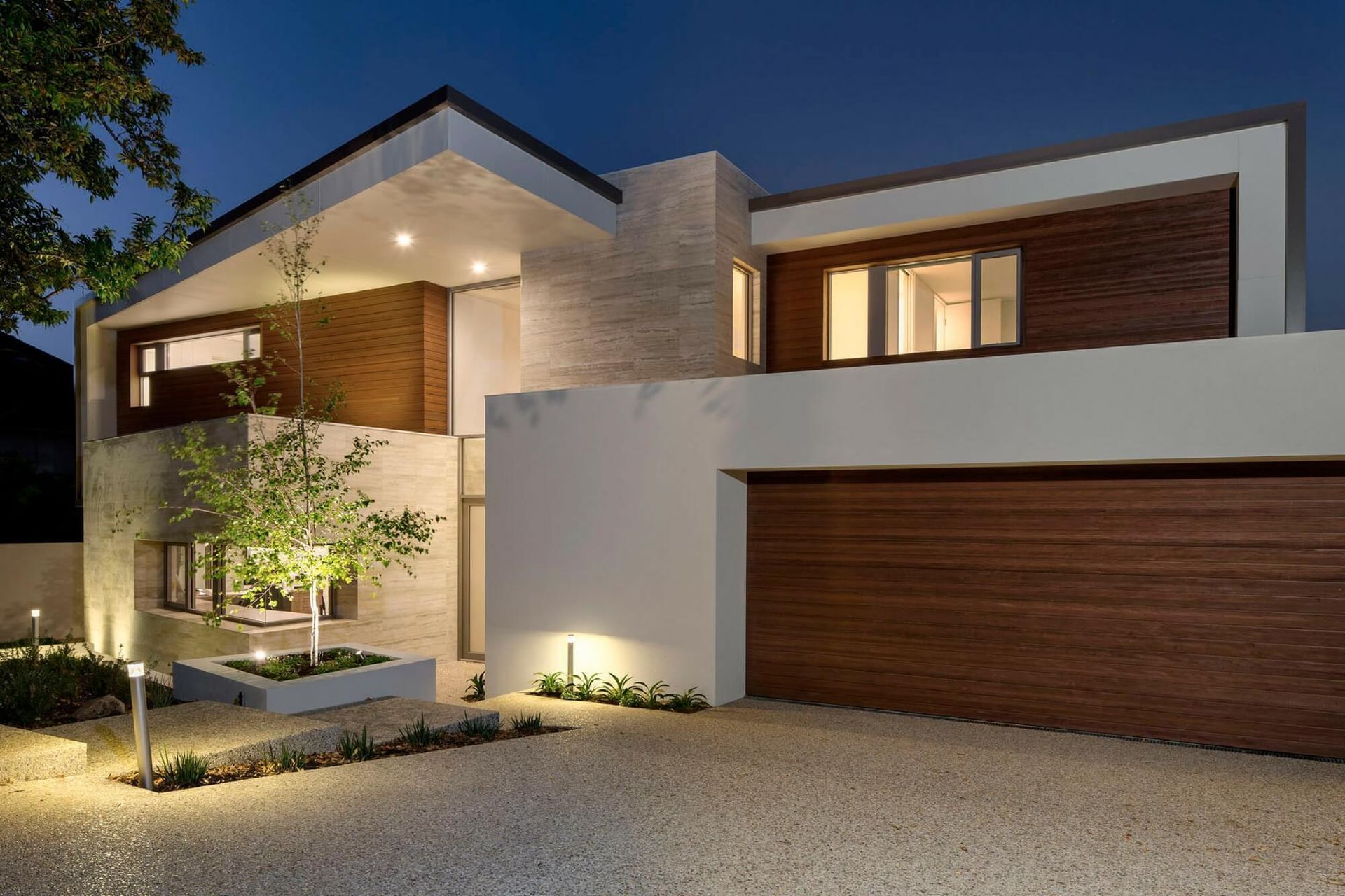 Timber weatherboards contrast nicely with the clean exterior of this house.