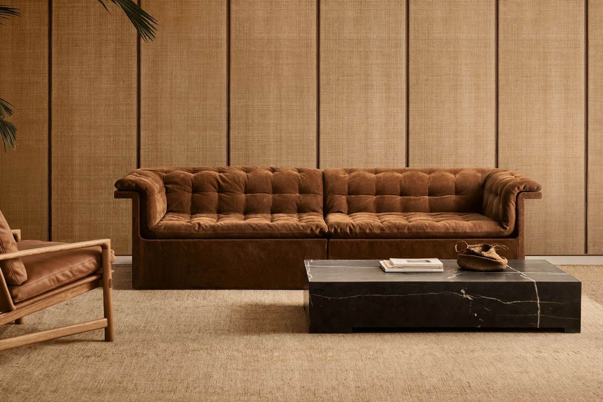 The Furrow Sofa from Dawson & Co. artfully combines the Chesterfield-inspired tufted motif with a sleek, contemporary form.