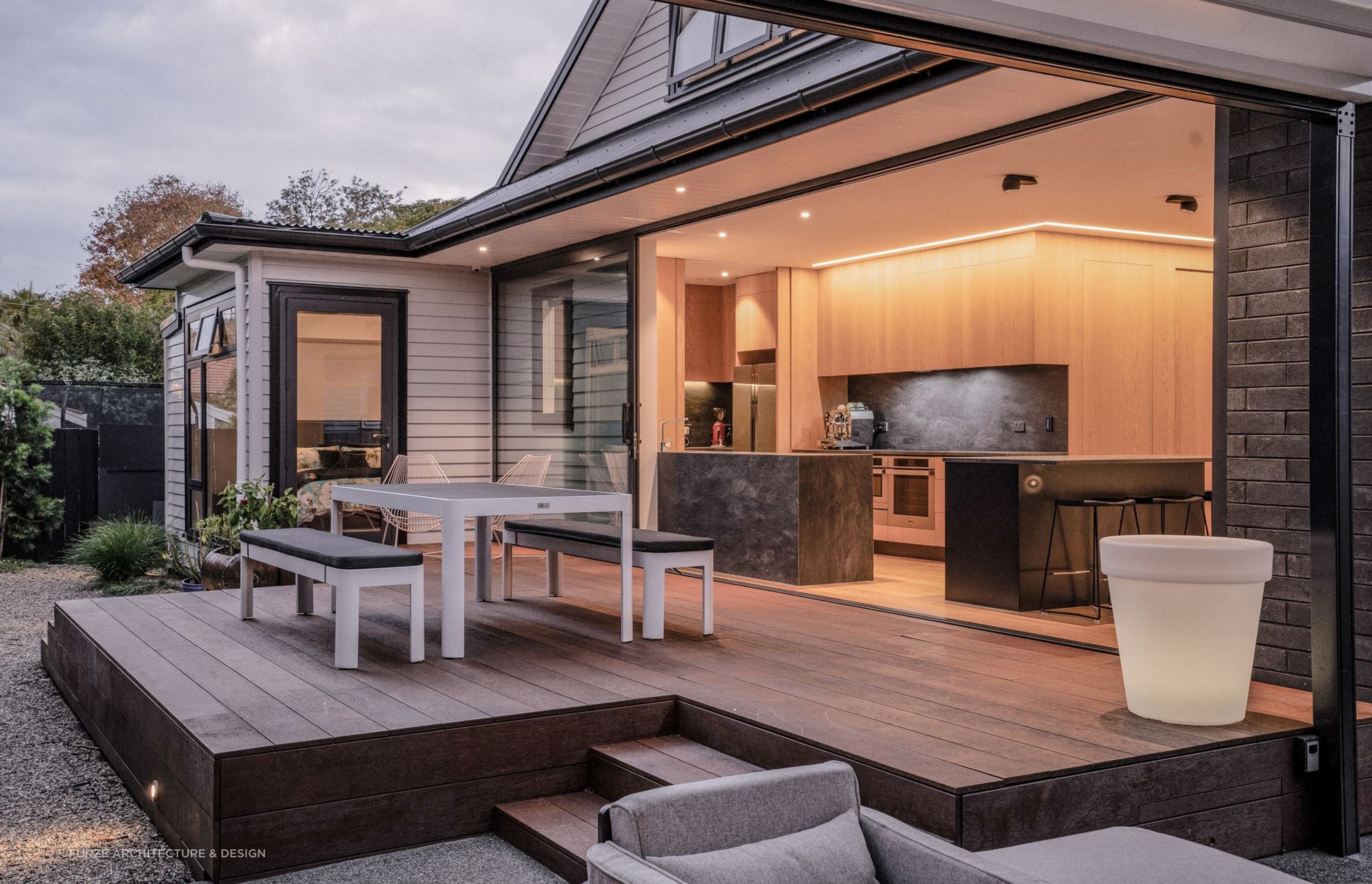 This porcelain stone splashback looks great from inside and outside the incredible Furze House.