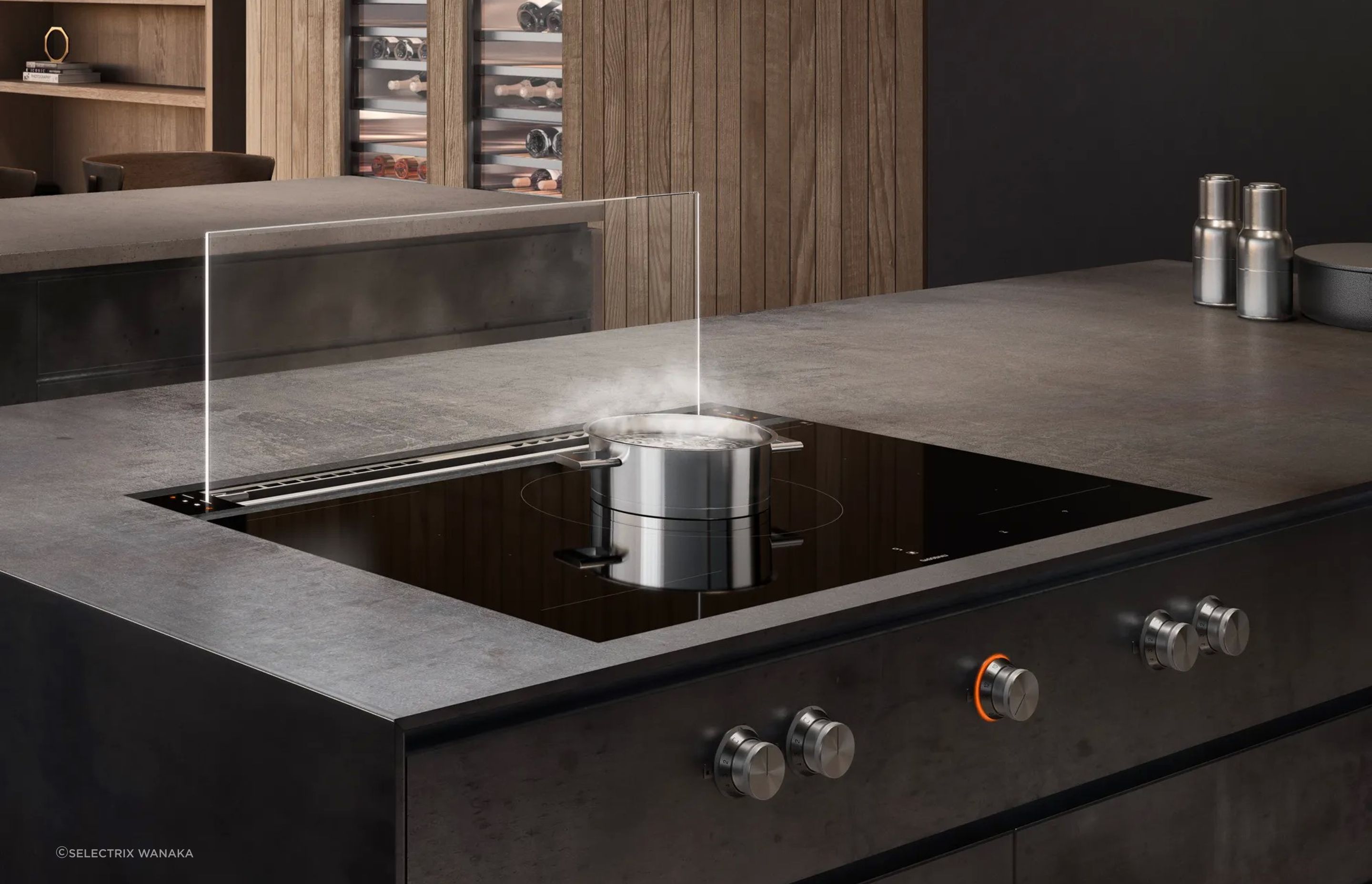 The sleek Gaggenau Downdraft Hood can fully retract when not in use.