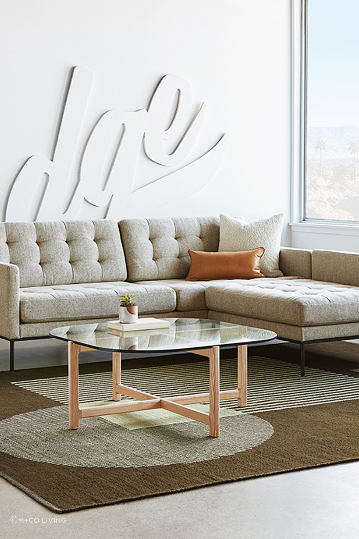 Glass coffee tables can enhance a room's openness.