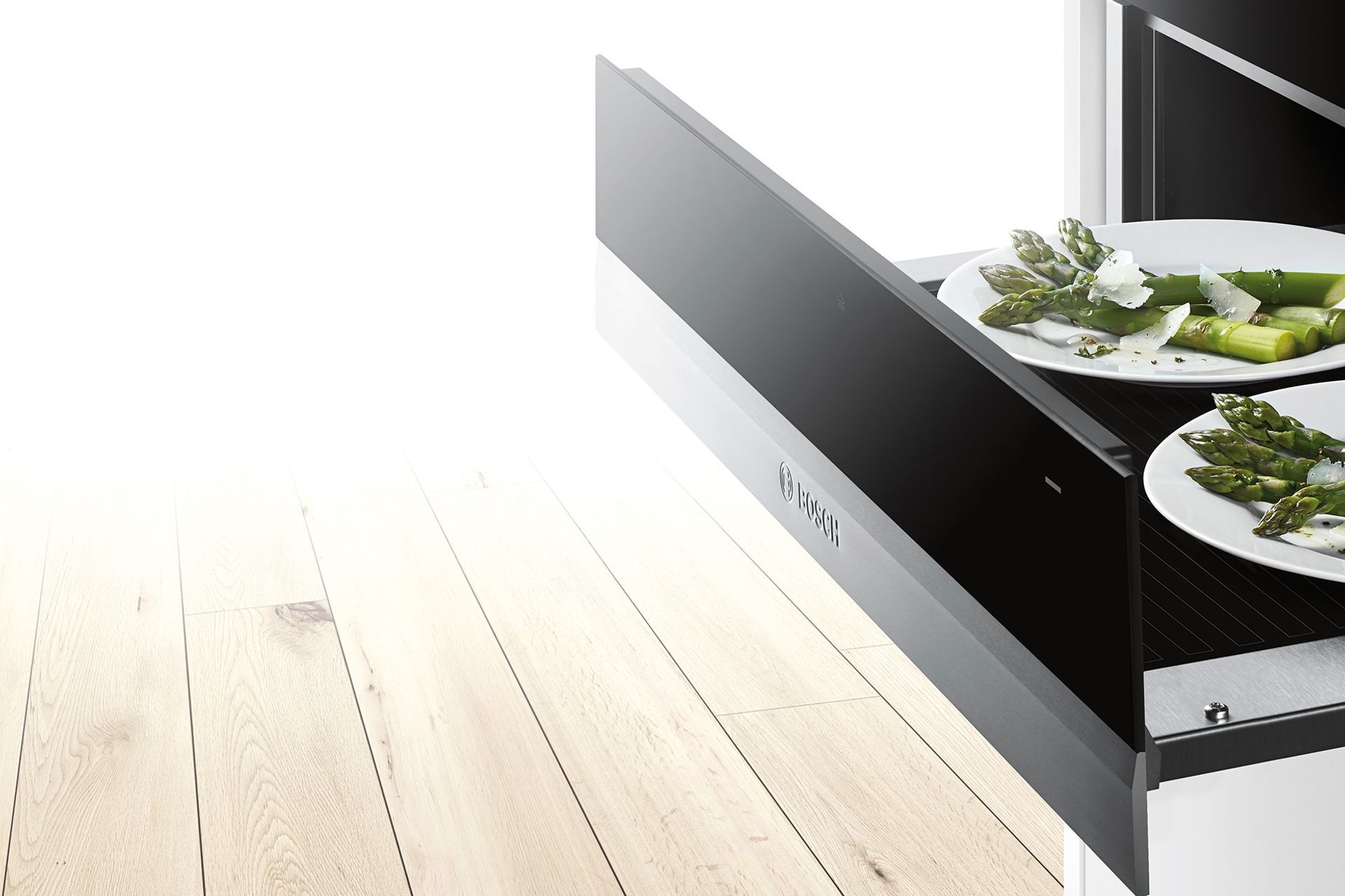 A warming drawer, like the stylish Bosch Series 8 Warming Drawer, is a unique but surprisingly handy addition to a modern kitchen.