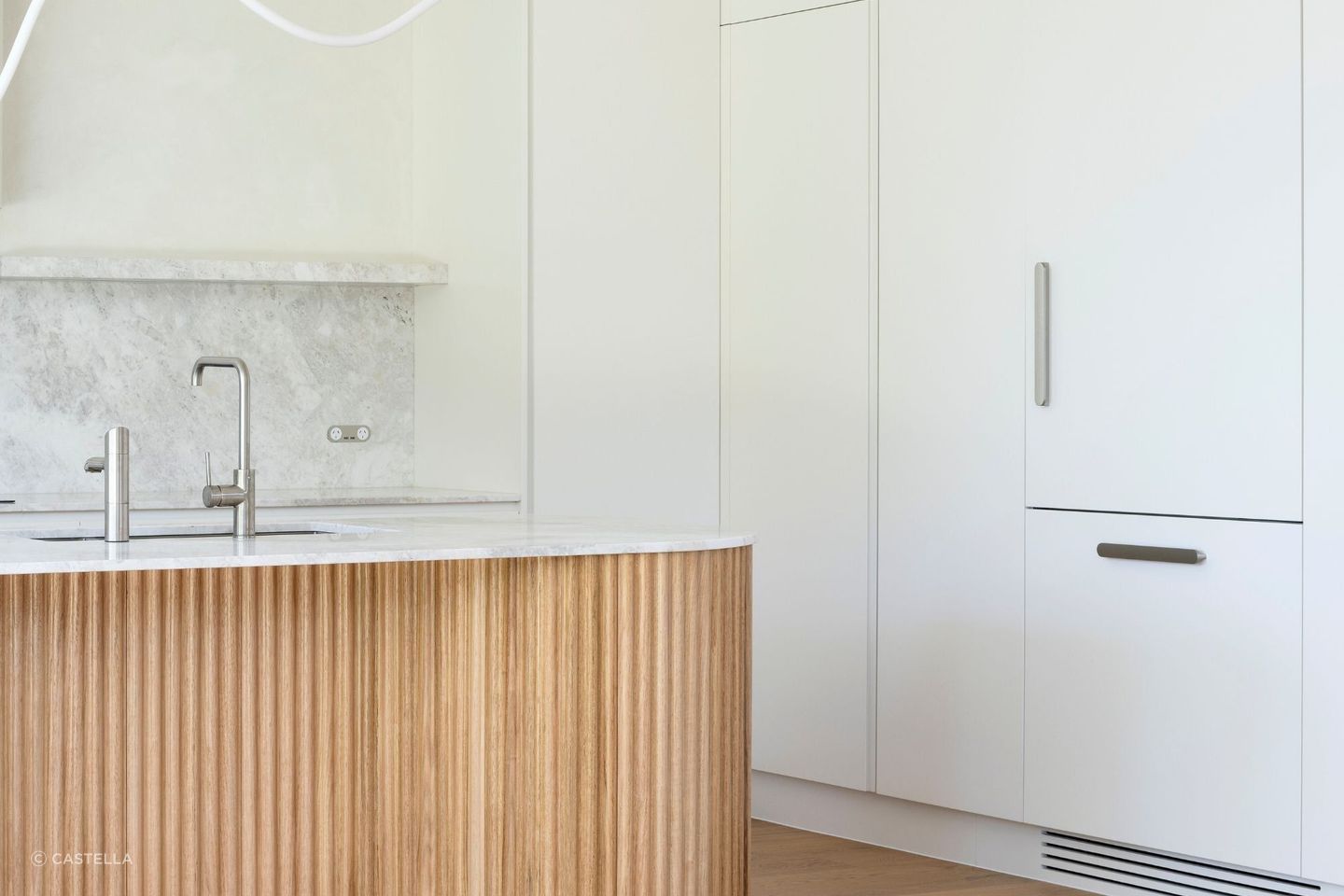 Cove handles in Dull Brushed Nickel