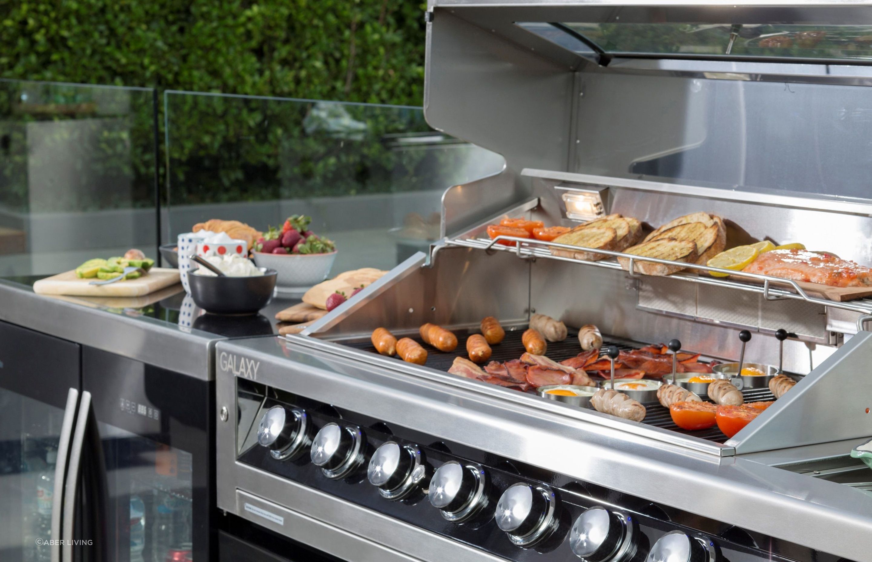 Gas burners like this Gasmate Galaxy Black Outdoor Kitchen with 6 Burner BBQ are quick and easy, lighting up at the push of a button.