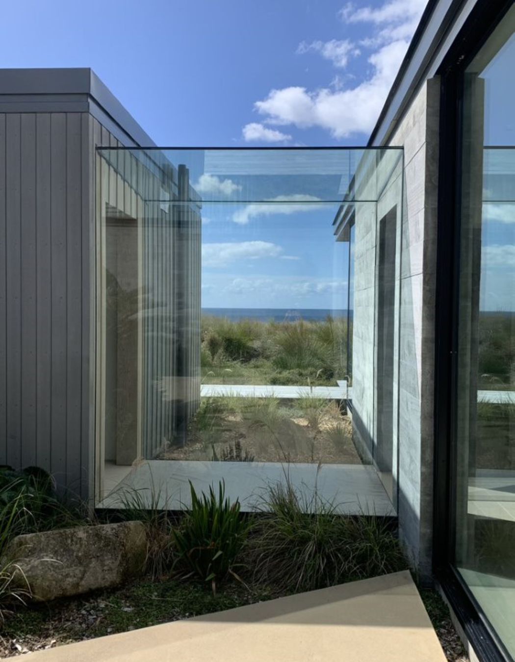 A glass link makes a contemporary junction between two separate forms.