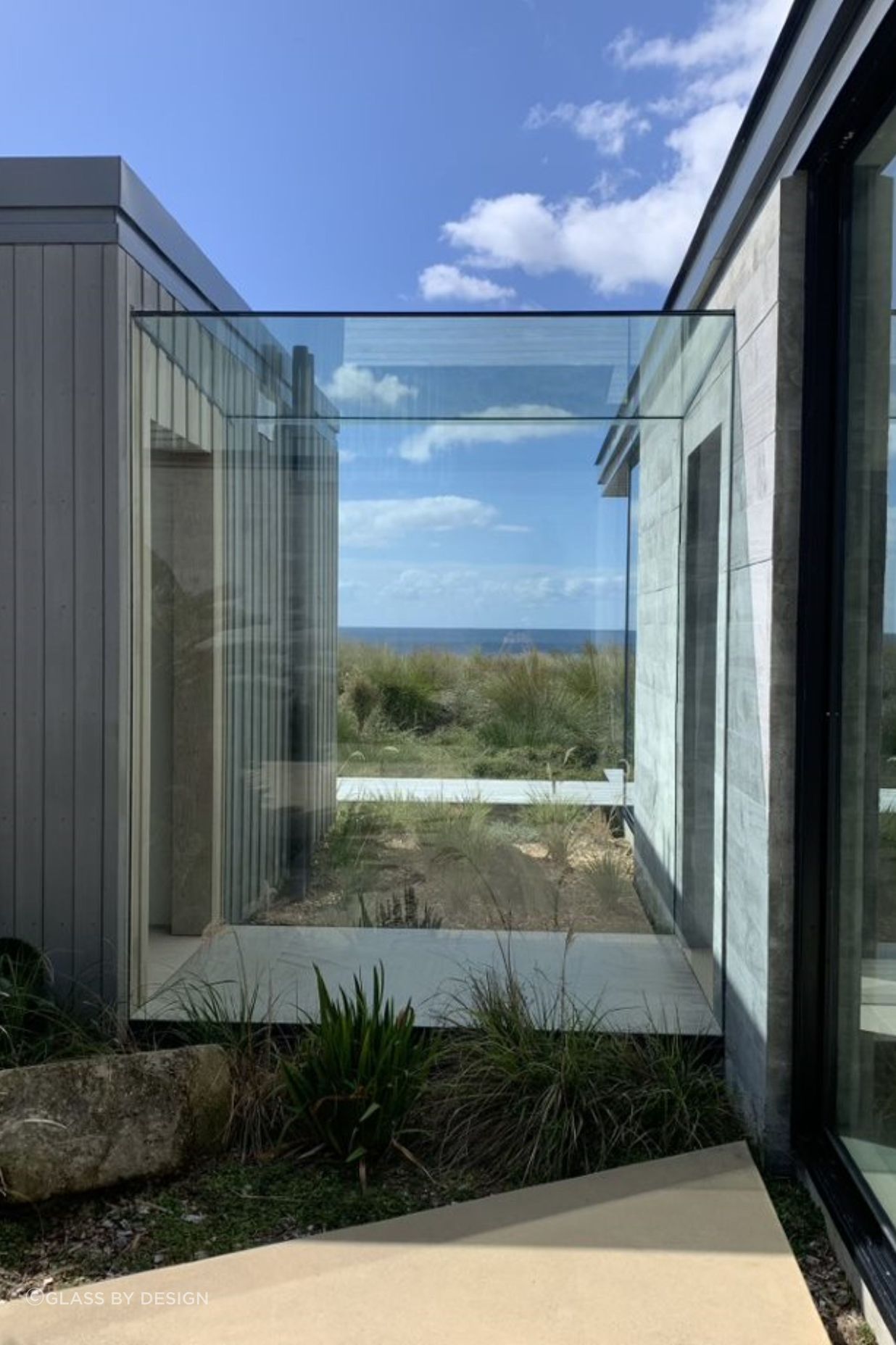 A glass link makes a contemporary junction between two separate forms.