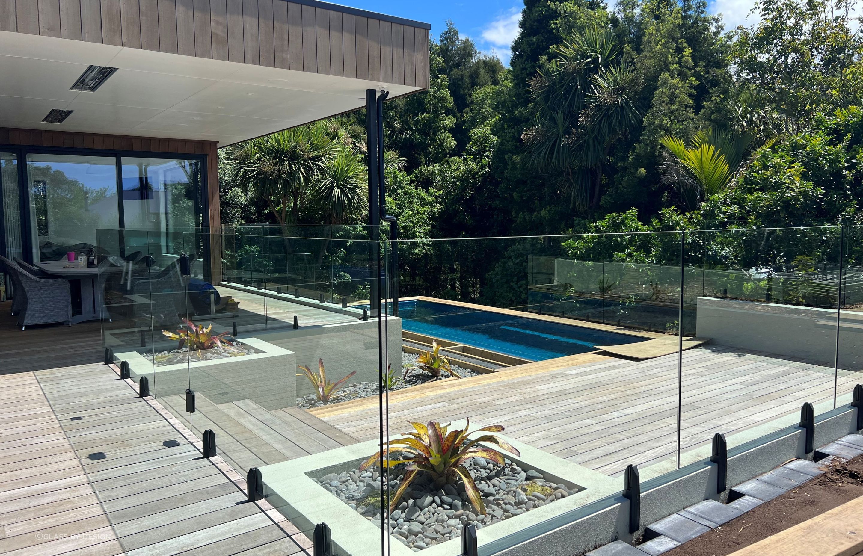 A Glass Pool Fence by Glass By Design showing the unobstructed view they provide.