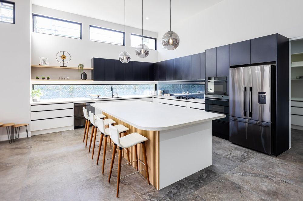 Globe pendant lights, while looking a little retro, still work in modern kitchens.