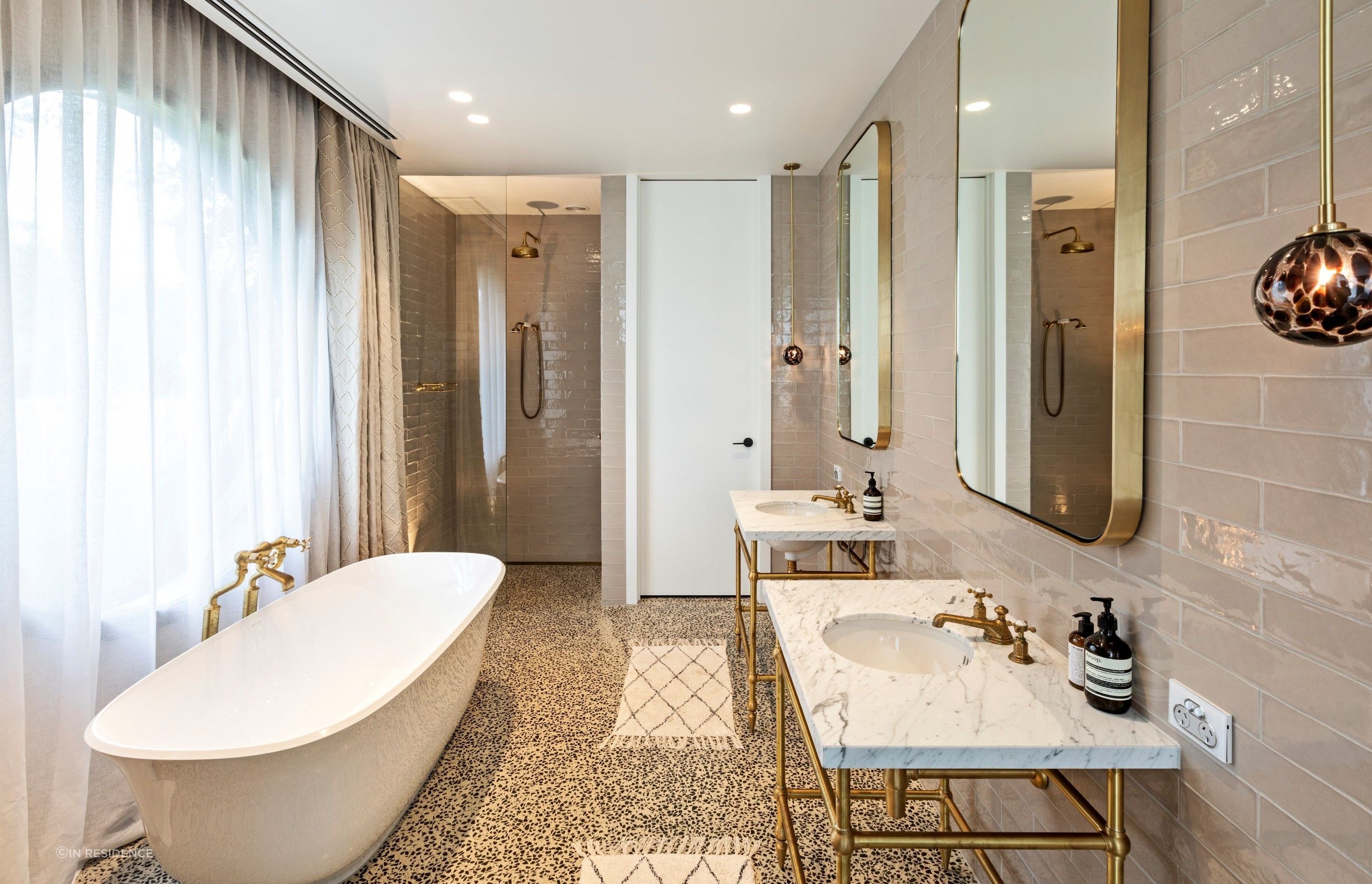 The Hawthorn Hill Basin Stand Vanity from In Residence, featuring an undermount basin, allowing its beautiful finish to shine.