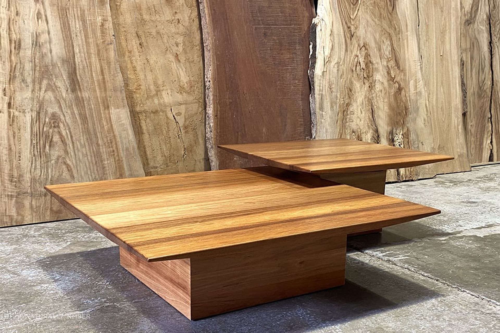 Overlapping surfaces create a striking appearance. Featured product: Kenzo Coffee Table.