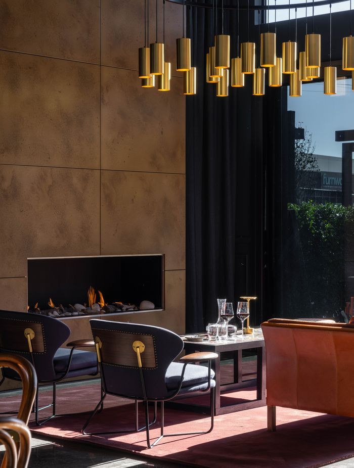 At 1.8m in diameter, the chandelier is a statement piece above the fireplace.
