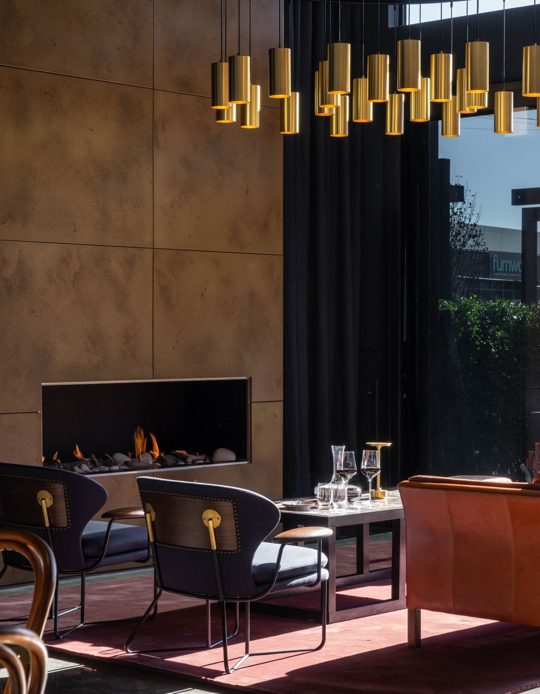 At 1.8m in diameter, the chandelier is a statement piece above the fireplace.