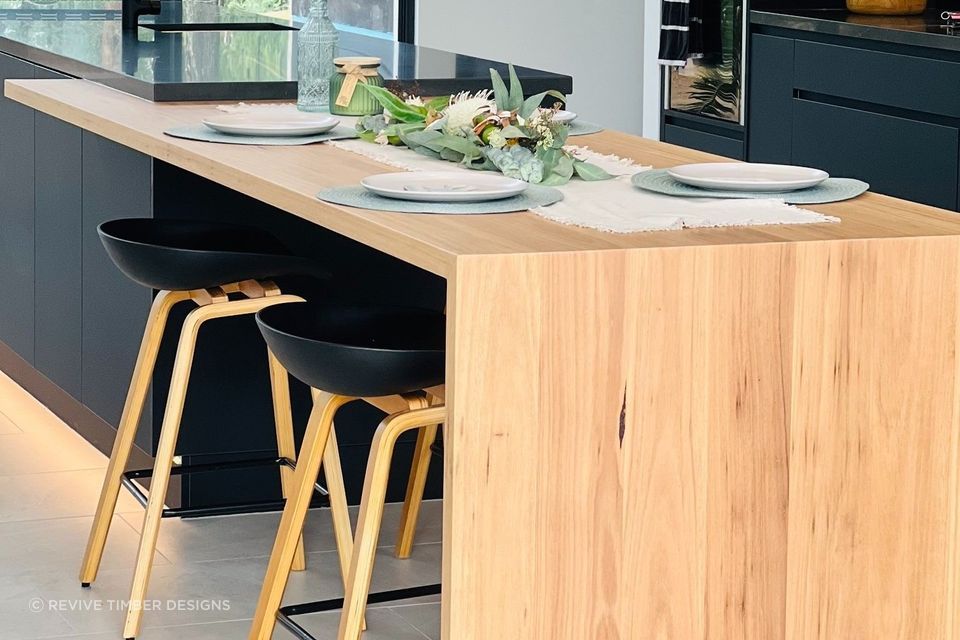 Stunning wooden benchtops like these Handcrafted Timber Benchtops by Revive Timber Designs bring instant warmth to a kitchen.