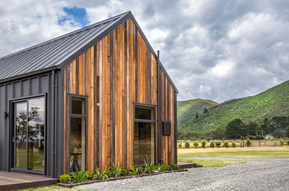 A stunning example of Mixed Species Hardwood Cladding in Vertical Shiplap from Hardwood Timbers NZ.