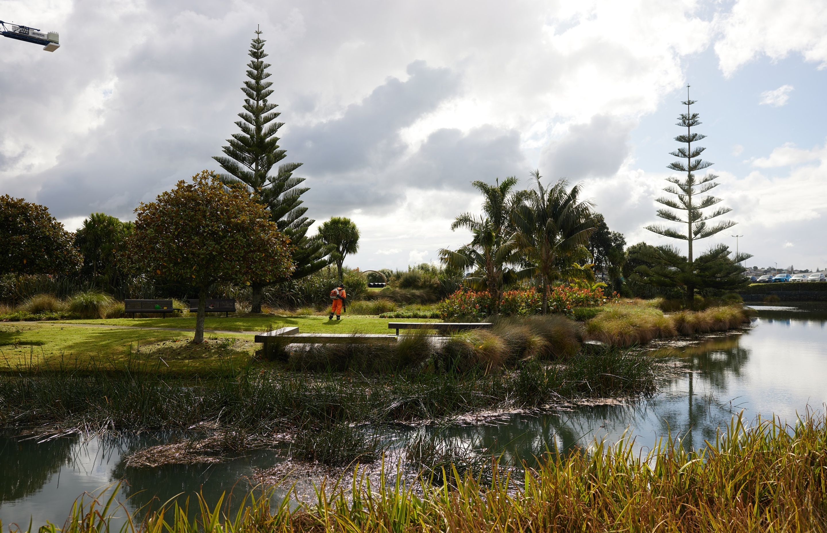 A gardener from Natural Habitats maintains the beautiful grounds of Healthcare Park.