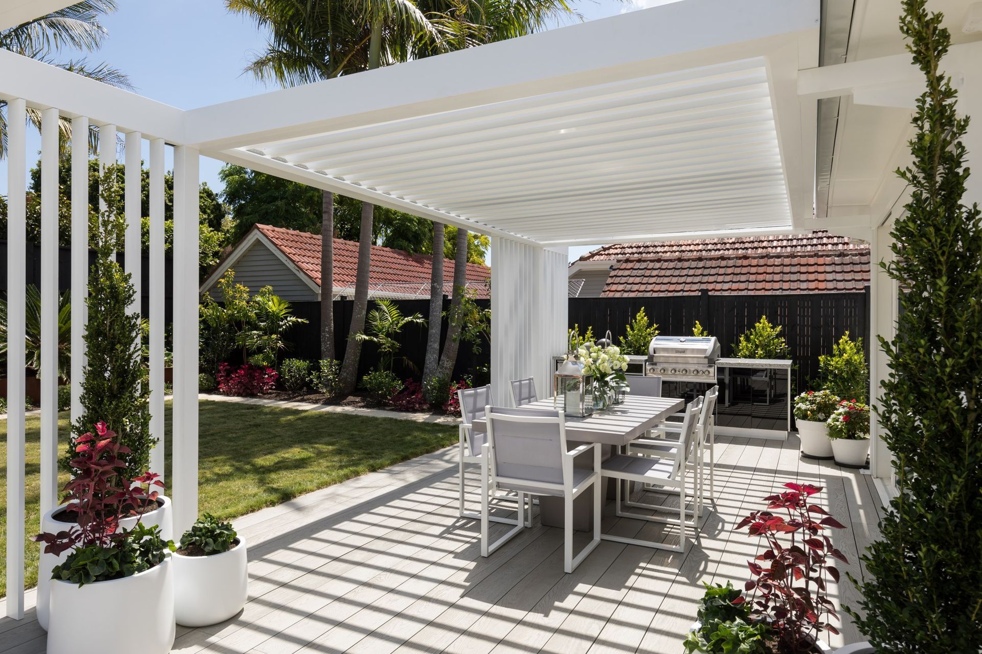 A sophisticated pergola with automated louvres gives the homeowners of this Herne Bay home shade and shelter when they need it. | Photography: Mark Scowen Photography