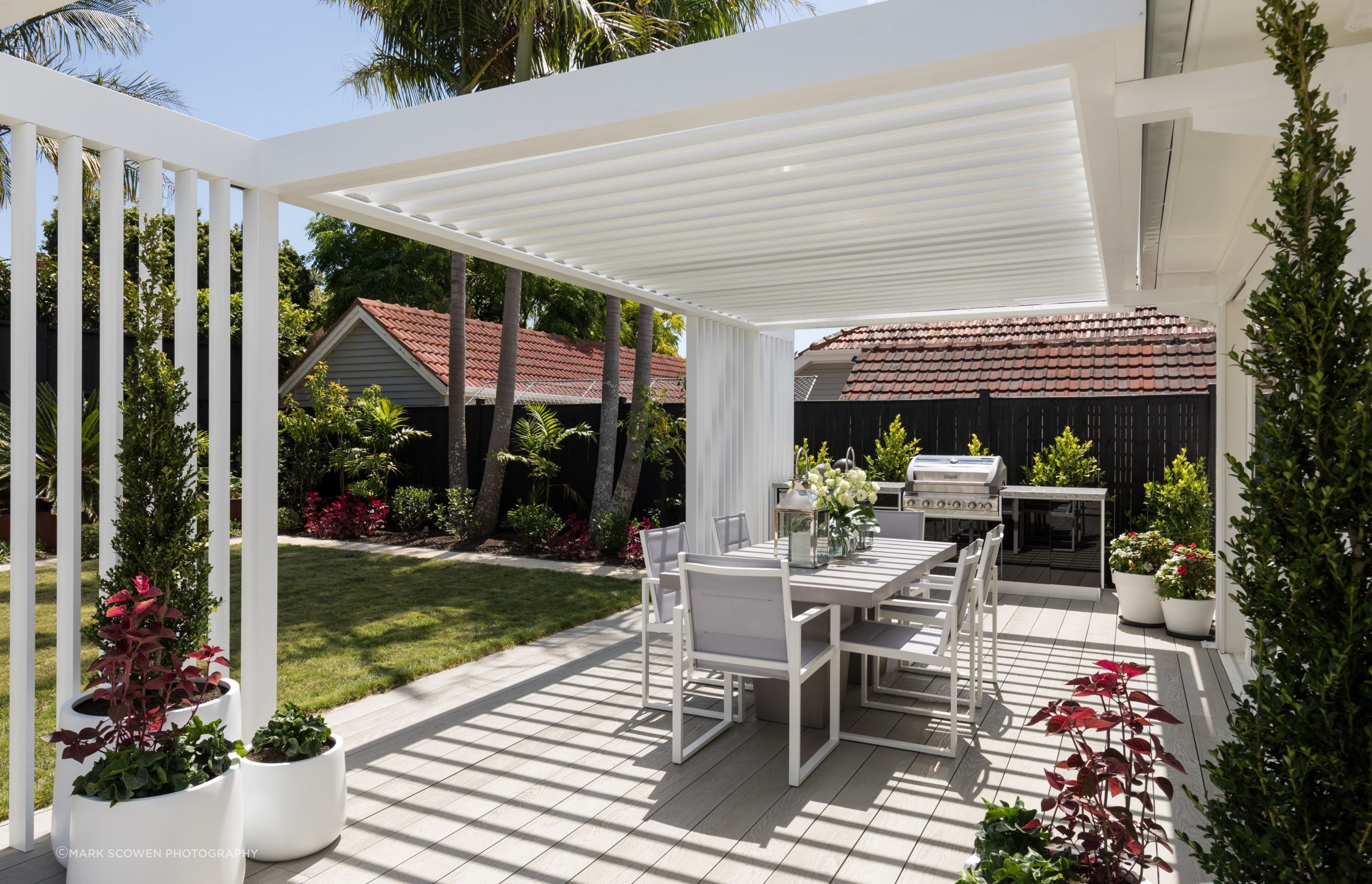 A sophisticated pergola with automated louvres gives the homeowners of this Herne Bay home shade and shelter when they need it. | Photography: Mark Scowen Photography