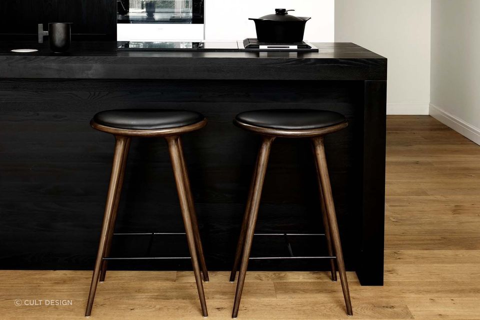 Choosing bar stools that complement the interior styling of your space is crucial, stylishly executed here with the High Stool by Mater from Cult Design.