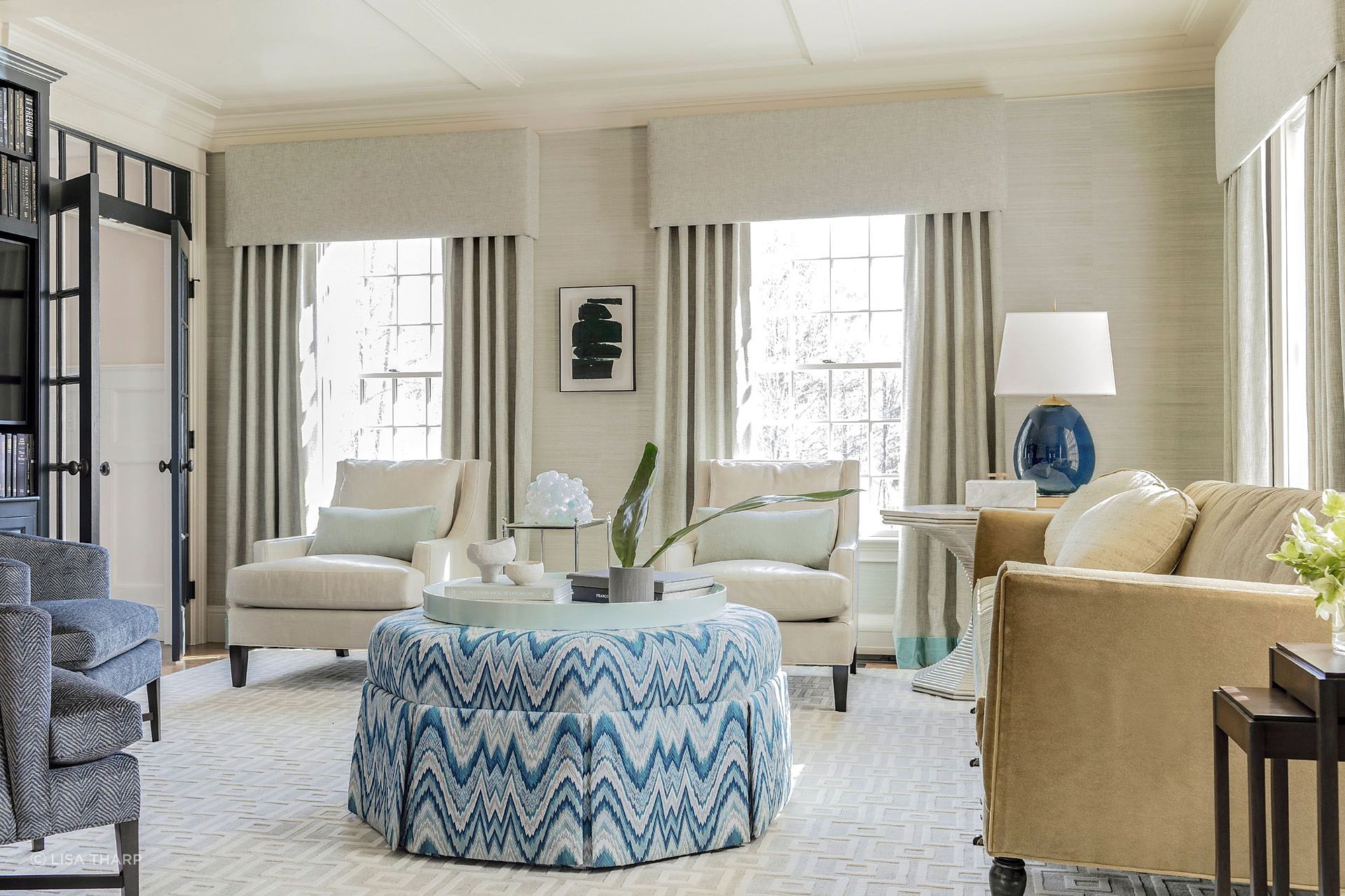 An exquisite flamestitch ottoman in this stylish home in Hillcrest.