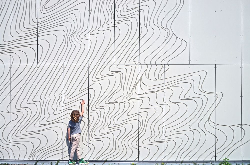 "It is important to consider using the colours, textures, and unique features of the façade materials to create inspirational designs that promote pride in the school."