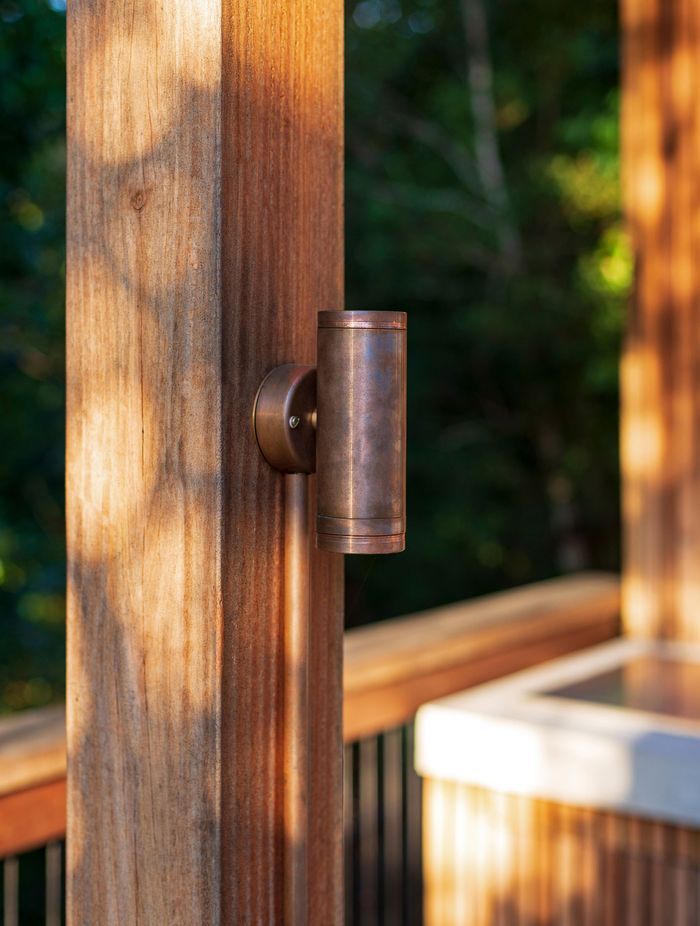 These solid brass pillar lights complement timber beams and pillars nicely.