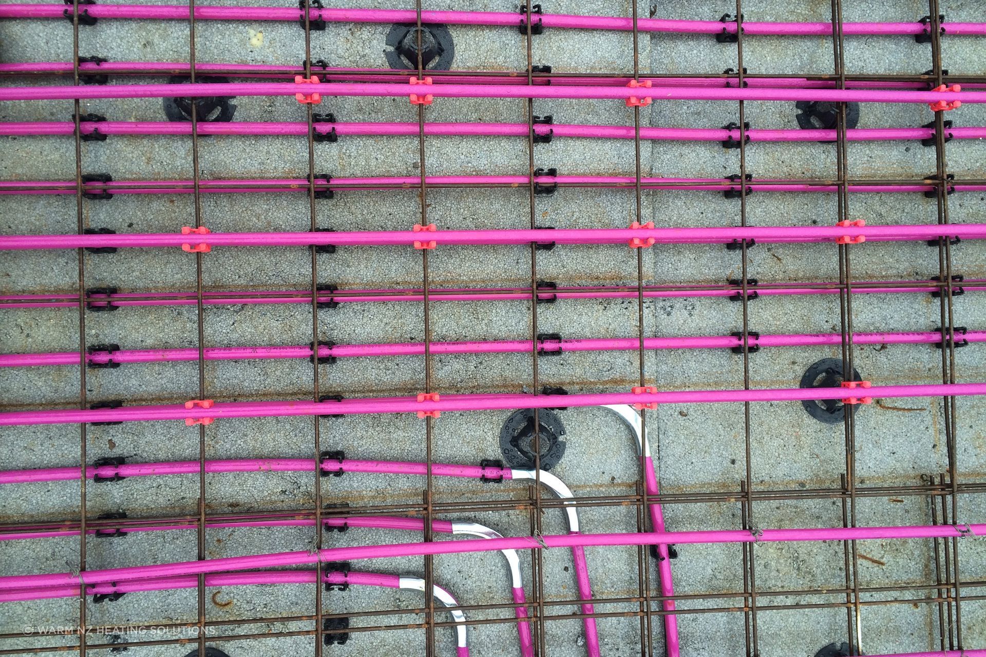 The underfloor systems are all custom-designed by qualified heating engineers. Instead of using radiators to heat a room, hot water pipes are laid either into the concrete floor slab or under wooden floors between the joists. This warms the slab/floor, providing a warm floor and radiant heat in the room.
