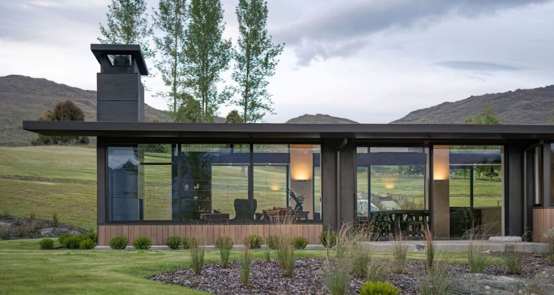 Designed by Mason &amp; Wales, this secluded Queenstown home has full-height glazing supplied by E13 Performance Windows.