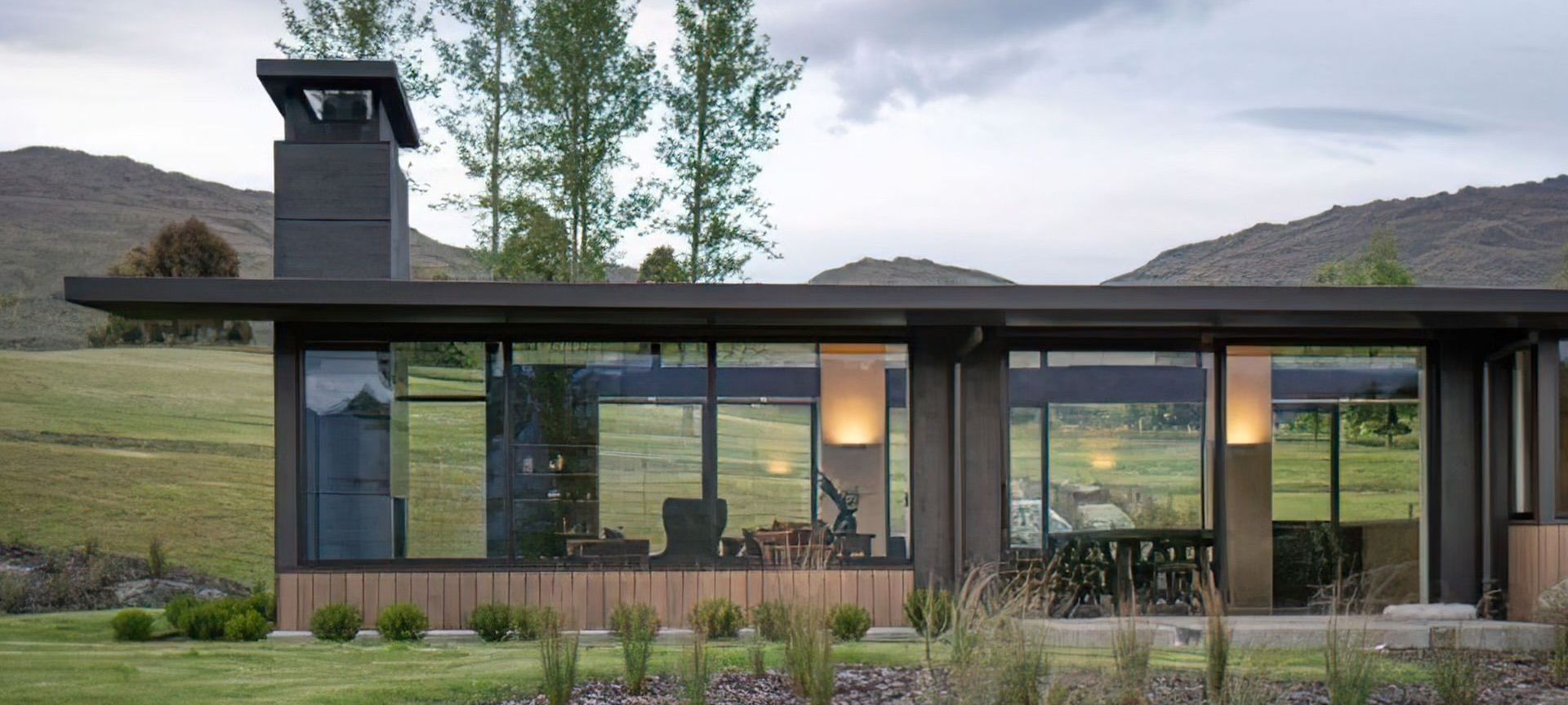 Designed by Mason &amp; Wales, this secluded Queenstown home has full-height glazing supplied by E13 Performance Windows.