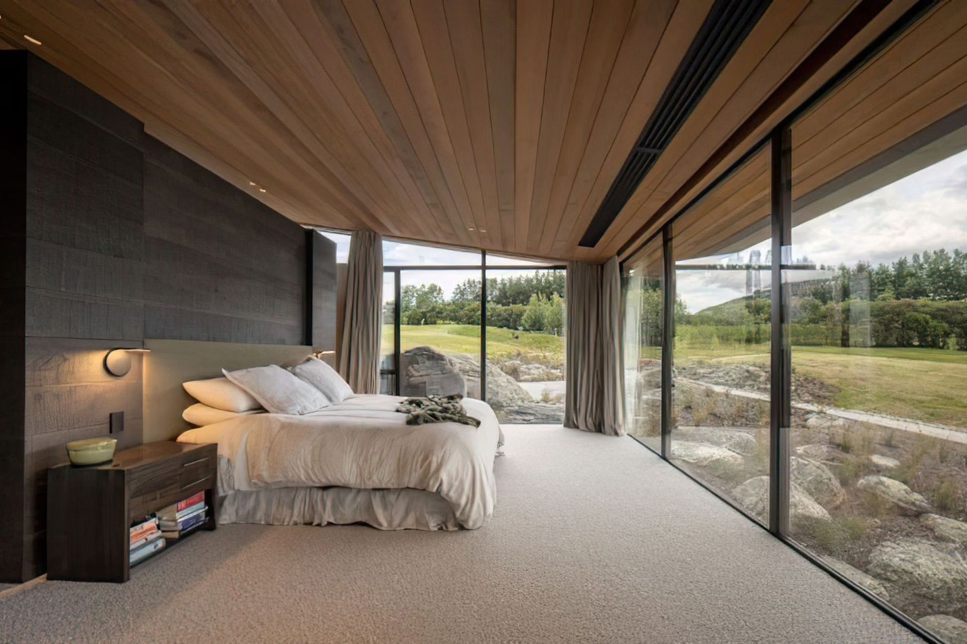 Low-E coatings can reduce heat loss by as much as 50%, providing long term energy savings in homes with a large amount of glazing like this Queenstown property designed by Mason & Wales.