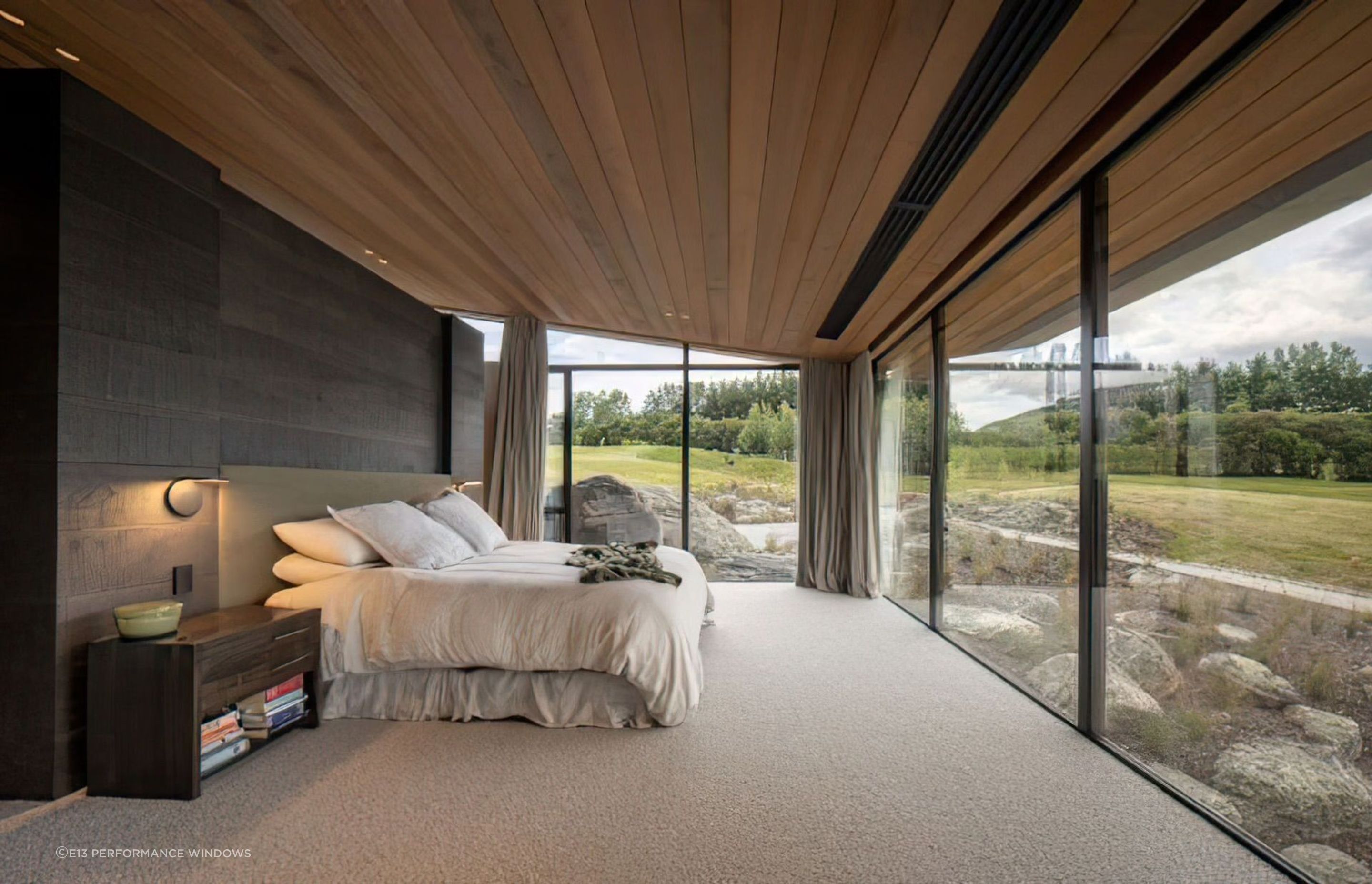 Low-E coatings can reduce heat loss by as much as 50%, providing long term energy savings in homes with a large amount of glazing like this Queenstown property designed by Mason & Wales.