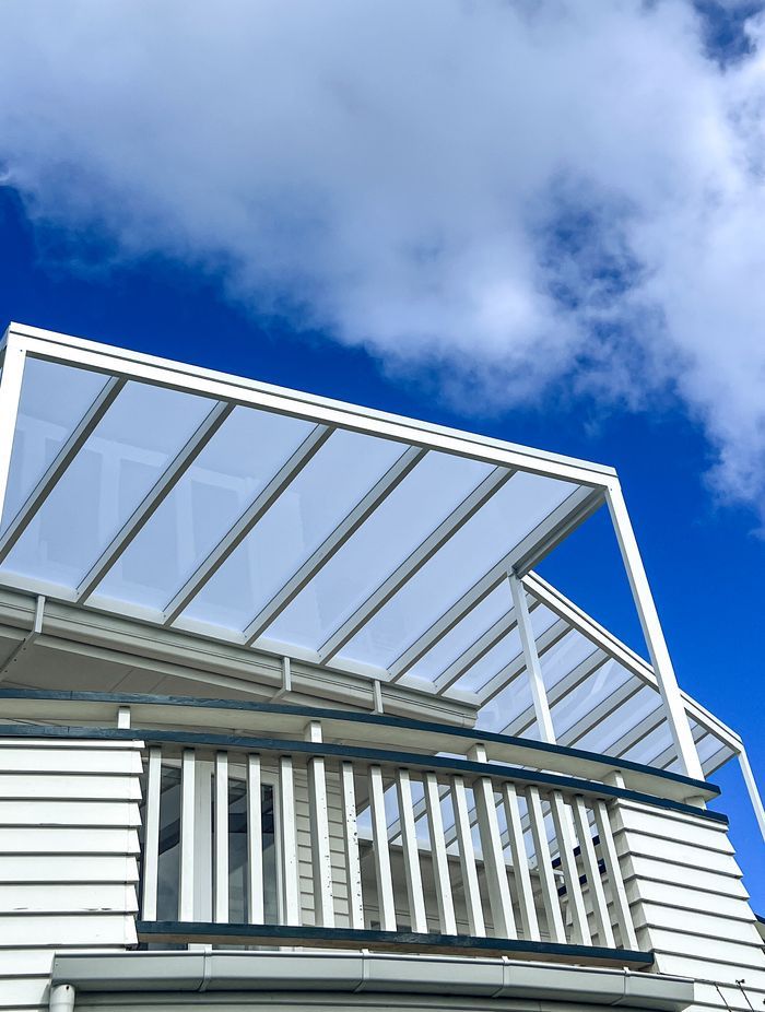 When integrating a pergola with an existing building it's crucial to customise the colour to match.