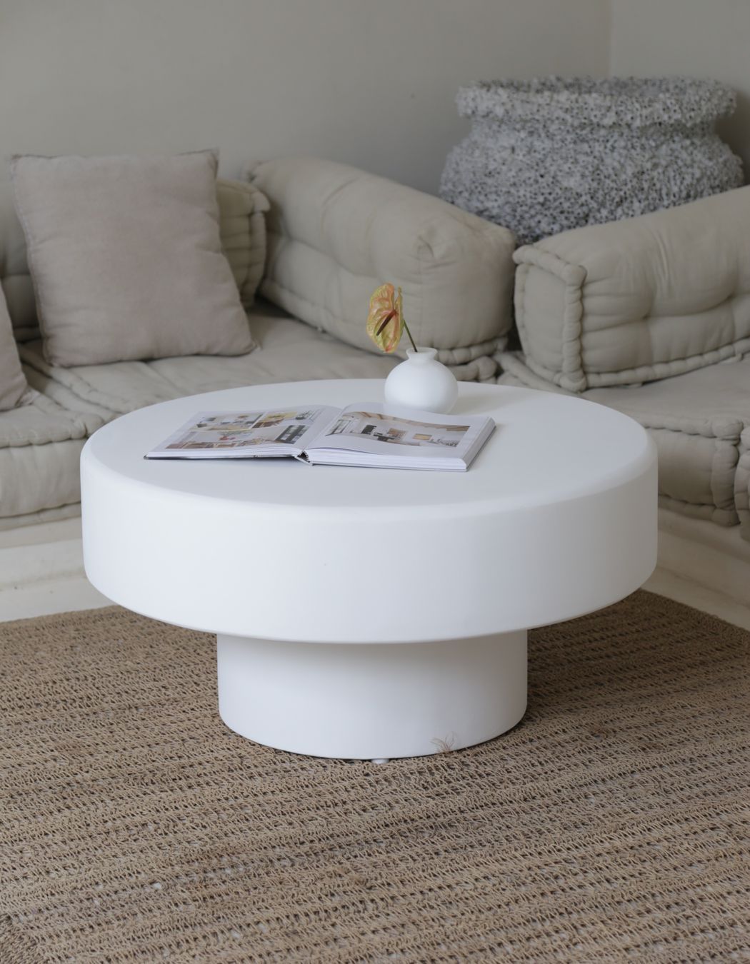 This Mediterranean coffee table has been handcrafted from a timber frame, coated with concrete, and finished in white matt paint. Featured product: Palma Coffee Table.