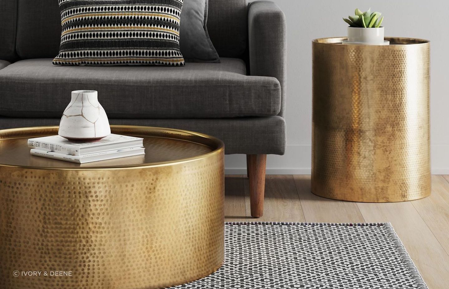 This intricately hammered barrel coffee table showcases a distinctive and elegant design.