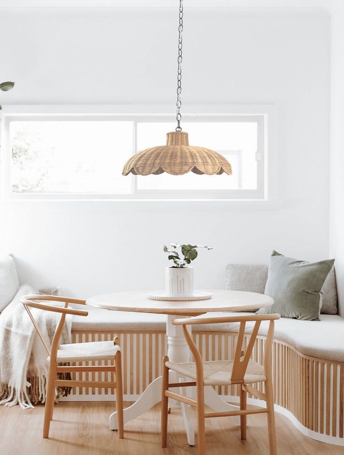 The Alice Scallop Rattan Pendant Light by Ivory & Deene has a relaxed and natural quality in design and texture.