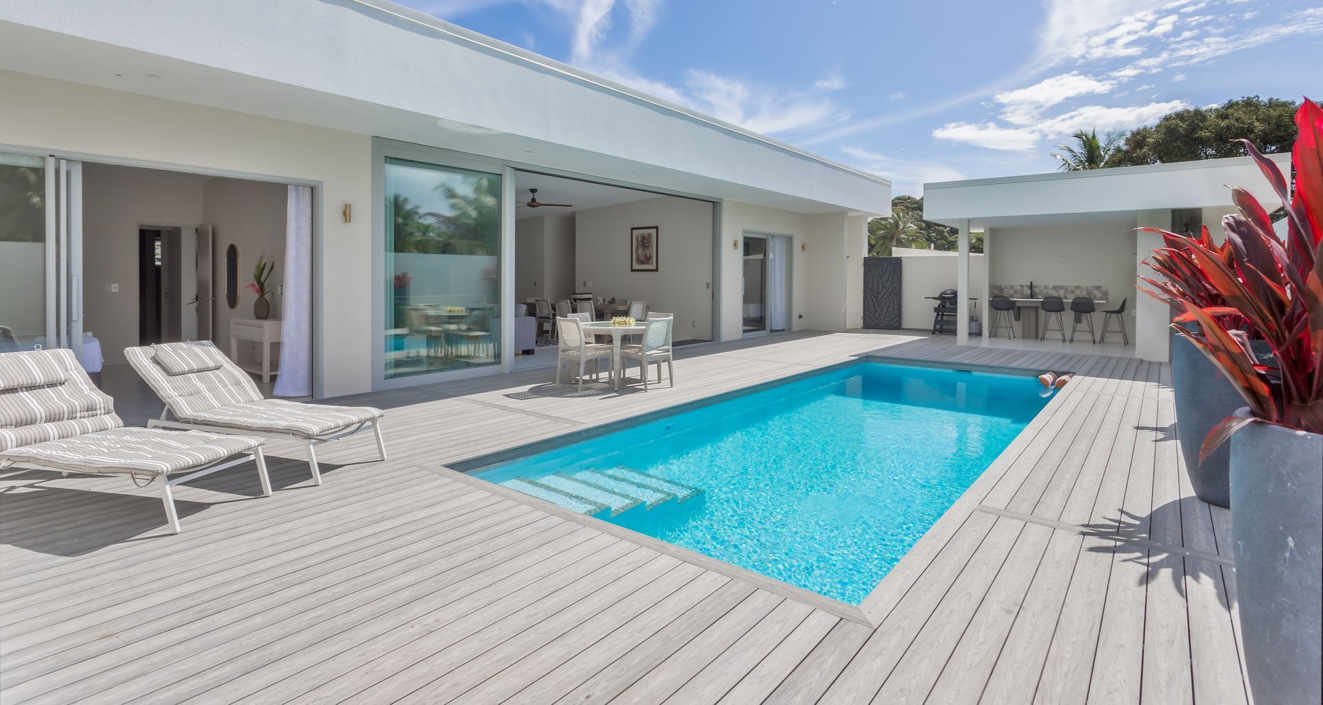 Composite decking is ideal surrounding the pool.