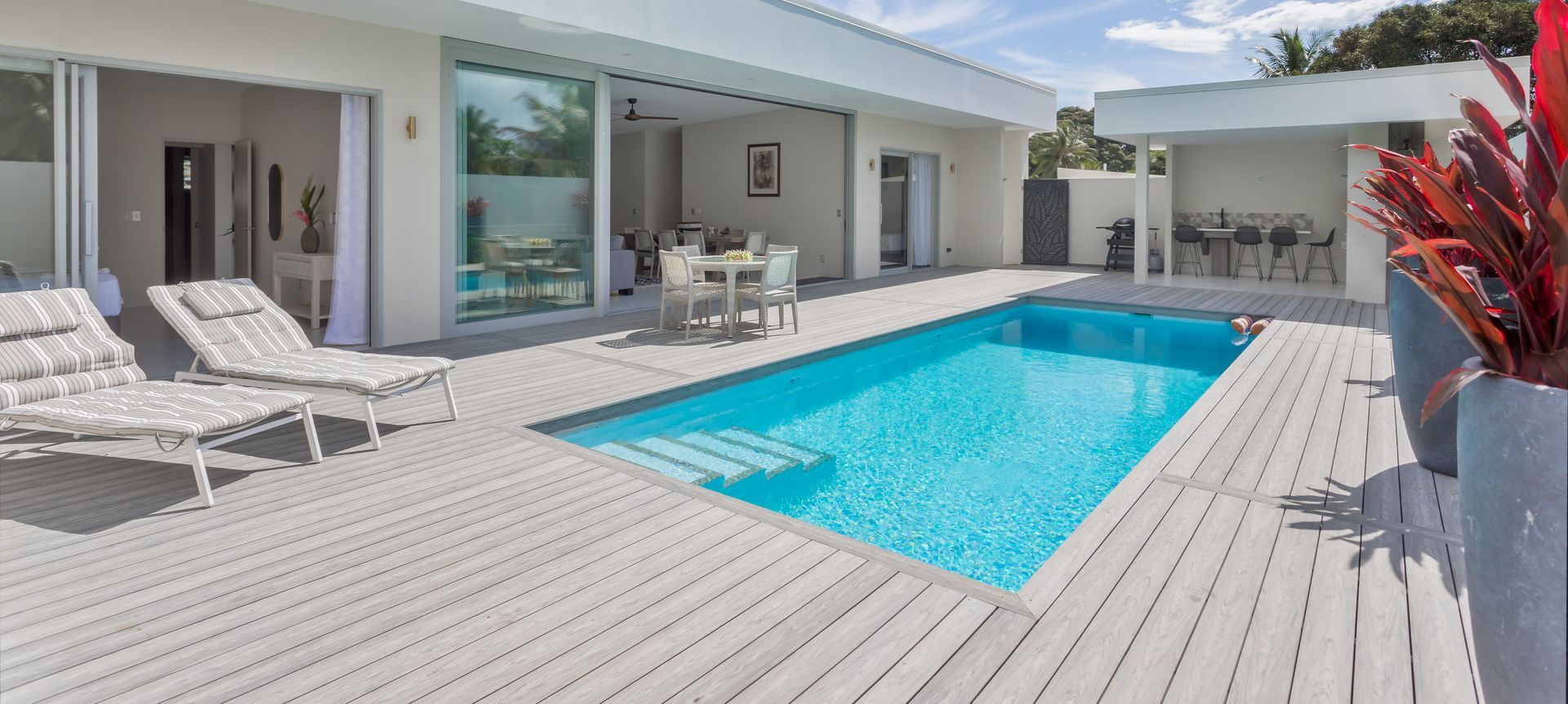 Composite decking is ideal surrounding the pool.