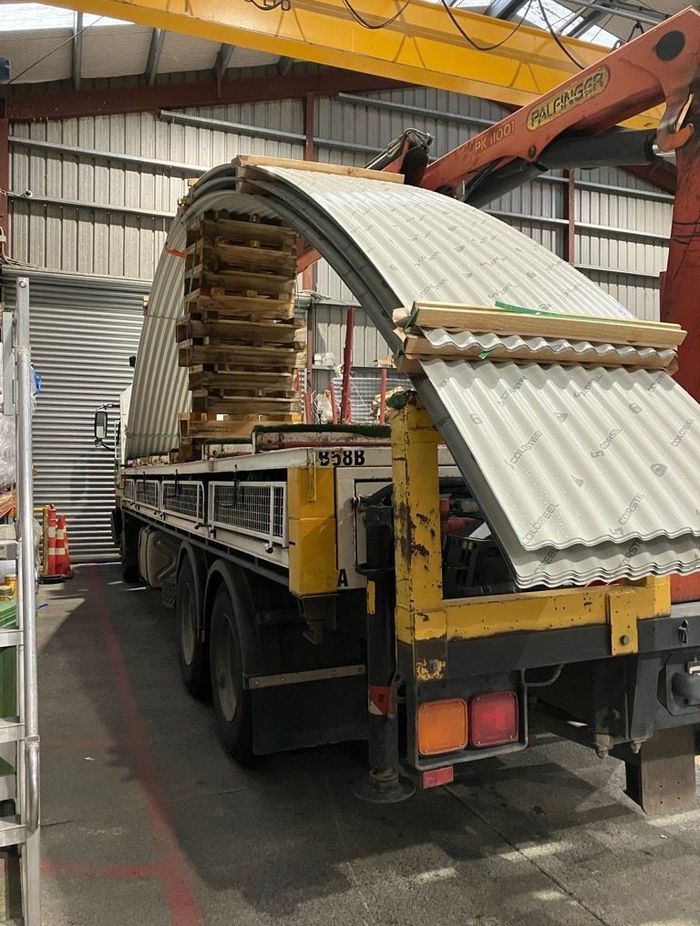 Dimond Roofing's longest curved sheets ready for transport and delivery.