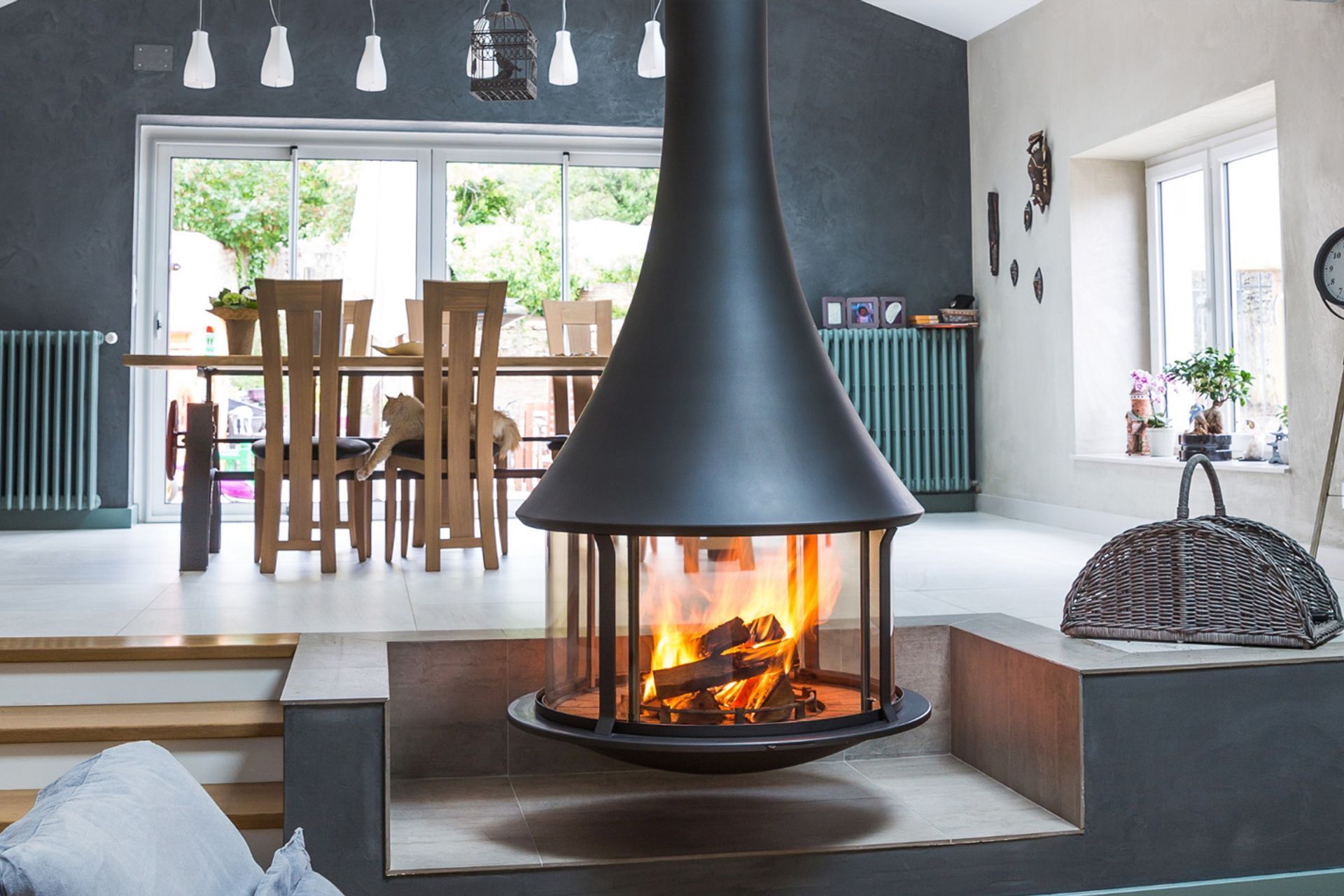 The J C Bordelet Zelia 908 Suspended Wood Fireplace offers a mesmerising 360 degree viewing area.