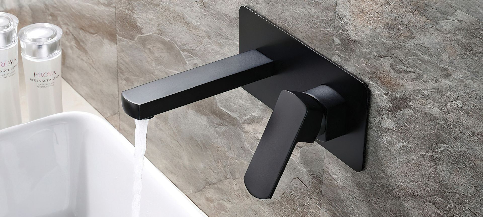 The Koko Wall Mixer with Spout in Matte Black.