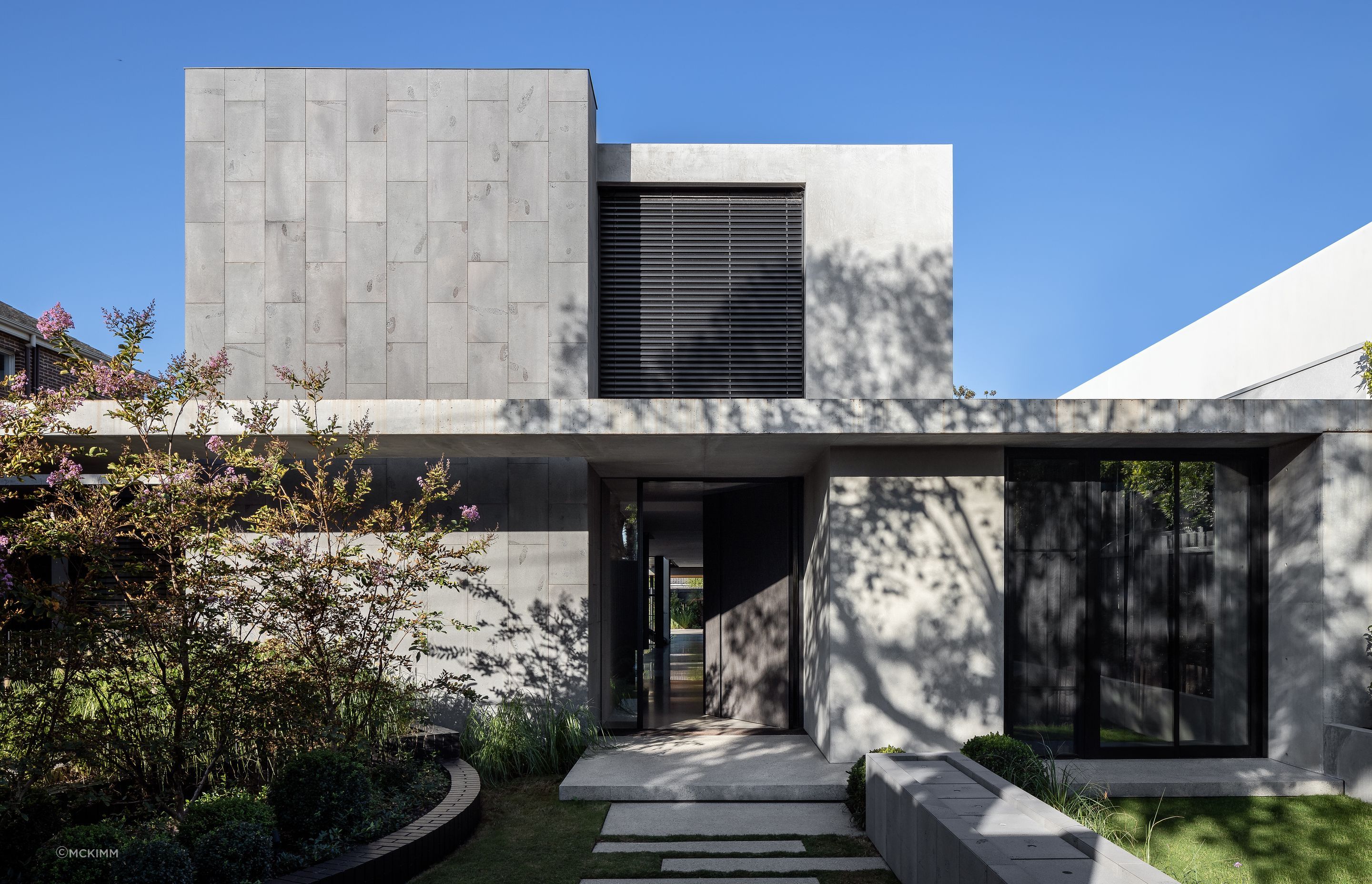 This entrance door takes centre stage at the stunning Sussex Residence. Featured project: Sussex Residence by mckimm
