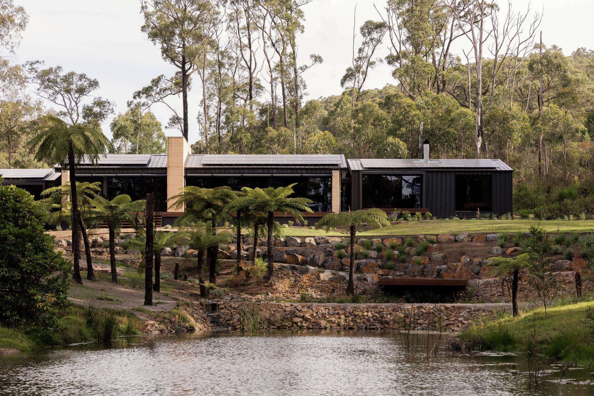 Yarra Valley by Vigor Homes draws its palette and presence from the surrounding terrain, with rammed earth walls that echo the colours of the valley floor | Photography by Timothy Kaye